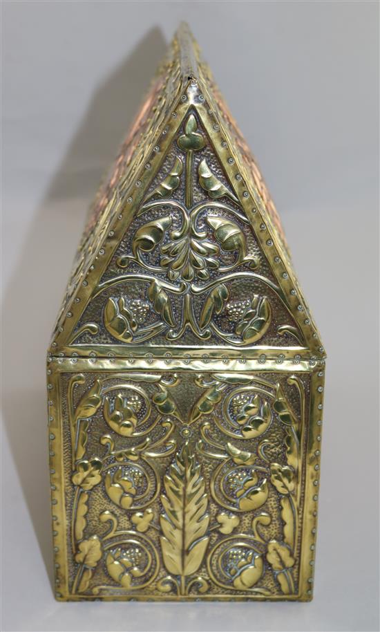 An Arts and Crafts embossed brass and copper casket, circa 1900, length 30cm, height 28cm